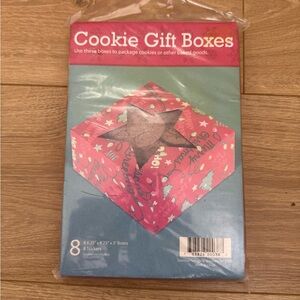 set of 8 seasonal cookie gift boxes with stickers for packaging baked goods.